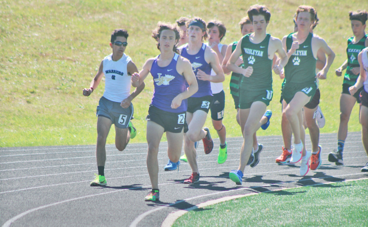 Wyatt Windham leads the pack at the White County Area meet.