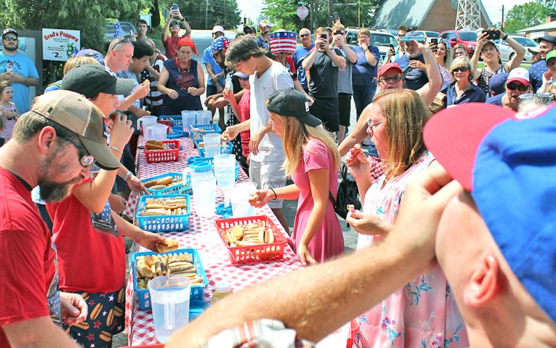 A total of 11 participants came to downtown Dahlonega to compete for a $100 prize and the honor of being the first Fourth of July hot dog eating contest champion.