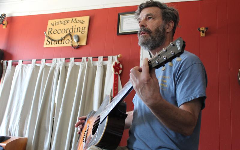 John Grimm is the man behind Vintage Music, a popular stop on the square for the past 33 years.