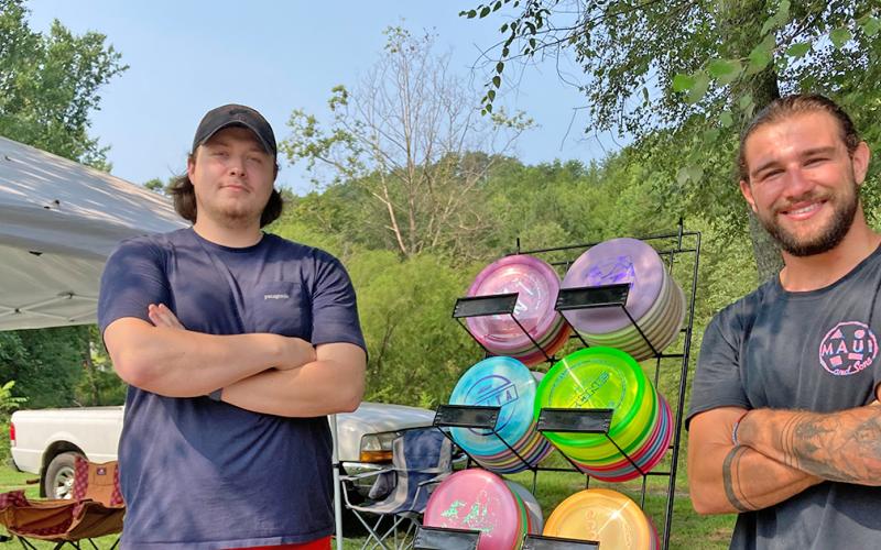 Tournament co-directors Jarrad Self (left) and Cole White, both of Dahlonega, were happy to host last week's Disc Golf tournament at Yahoola Creek Park.