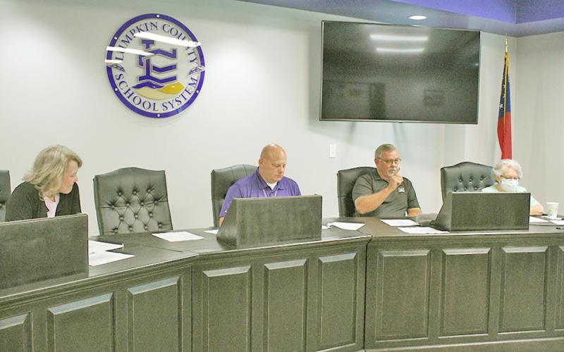 Board of Education members (from left) Lynn Sylvester, Superintendent Rob Brown, Jim McClure and Mera Turner defended the school system's position on the proposed budget at a recent public hearing.