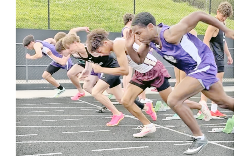 Runners Jalen Savoy and Cal Faulkner compete in the same heat during this week’s regional track meet against Gilmer.