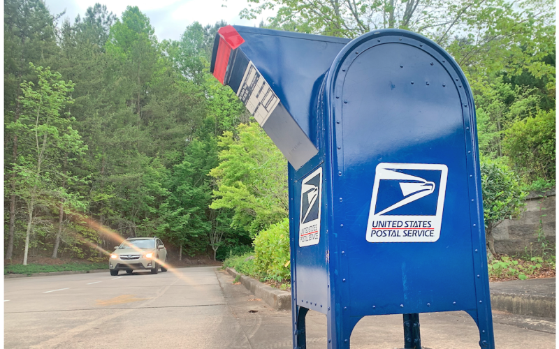 If you're shipping Dahlonega-to-Dahlonega mail it's best to avoid the big blue bin for now and hand your letter, package or parcel to an actual employee inside the post office.