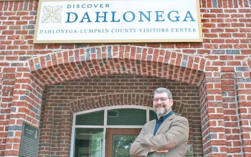 Dahlonega/Lumpkin County Tourism Director Sam McDuffie is ready to welcome spring travelers to the Visitors Center.