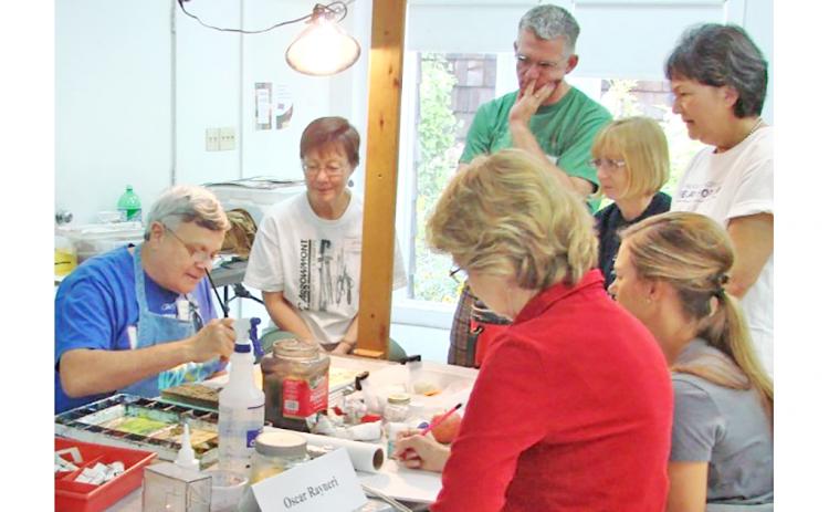 Watercolor artist Oscar Rayneri teaches students at Arrowmont School of Arts and Crafts in Gatlinburg, Tenn.