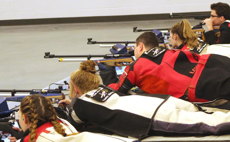 The LCHS rifle team takes aim during a match at the Hunting Grounds rifle range. The Indians defeated Roswell High School last week to improve to 2-1 on the season.
