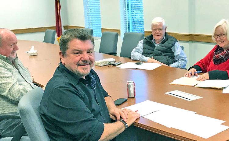 Members of the Lumpkin County Public Building Authority (from left) Daniel Harding, Chairman Frank Youngblood, Jim Curtis and Ruth Bohac voted to release $1,993,000 to the Board of Commissioners to help pay for the new library and Parks & Rec’s use.