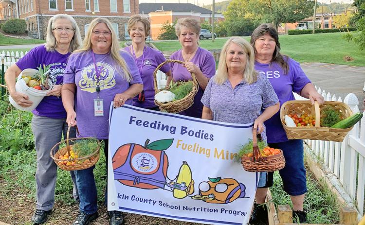 Pictured (from left): Judy Shubert—Long Branch Elementary Cafe Manager, Andi Foster—Blackburn Elementary Cafe Manager, Julie Knight-Brown—Lumpkin Schools Nutrition Director, Kathy Fleming—Lumpkin High School Cafe Manager, Vicki Carpenter—Lumpkin Middle School Cafe Manager and Brenda Christy—Lumpkin Elementary Cafe Manager show off the recent harvest.