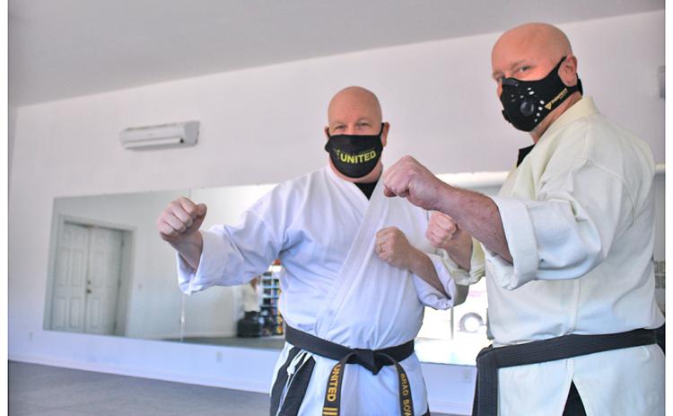 Instructors Brad Bowelle (left) and Wayne Marshall of Brad's United martial arts studio, have taught numerous students skills and techniques that transcend simply fighting another human. When facing hardship due to COVID-19, Bowelle was tasked with practicing the same resolve he preaches against the "unknown opponent" just to keep the doors of his studio open and in business.