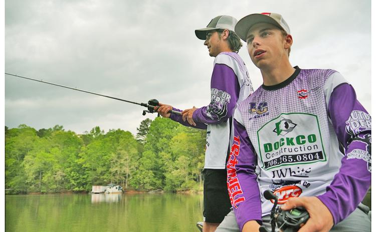 A.J. Moss (right) and his fishing partner Carder Dockery hit Lake Lanier for some added practice leading up to the Inaugural GHSA Bass Fishing State Championship this Saturday. The two will represent LCHS and the Lumpkin County Schools Fishing Club in hopes of bringing home the first ever state title.