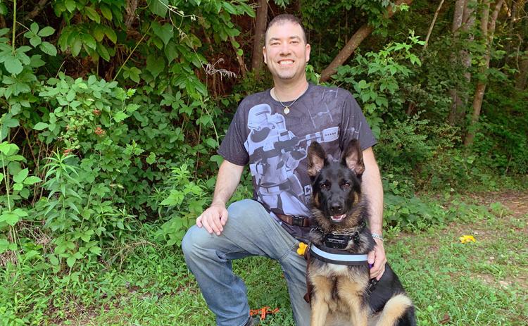 Dahlonega resident Brad Blazek, accompanied by his service dog Shadow, has bravely fought his own personal battle since suffering a brain injury while serving in Iraq. And he’s hoping to help others who have similar struggles, with his new children's book.