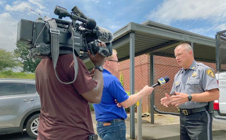 Lumpkin County Sheriff Stacy Jarrard speaks to an Atlanta news station following the 24-hour manhunt and apprehension of Gerardo Jonathan Flowers.