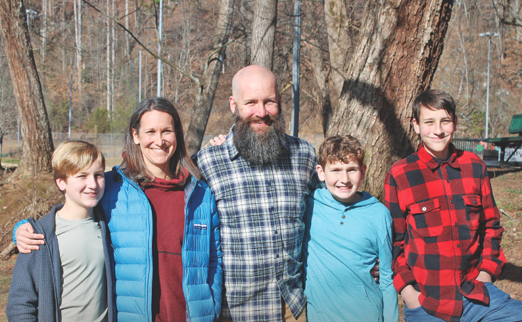 The Skogman family of hikers includes, from left, Grayson, Joni, Darrell, Baxter, and Jasper.