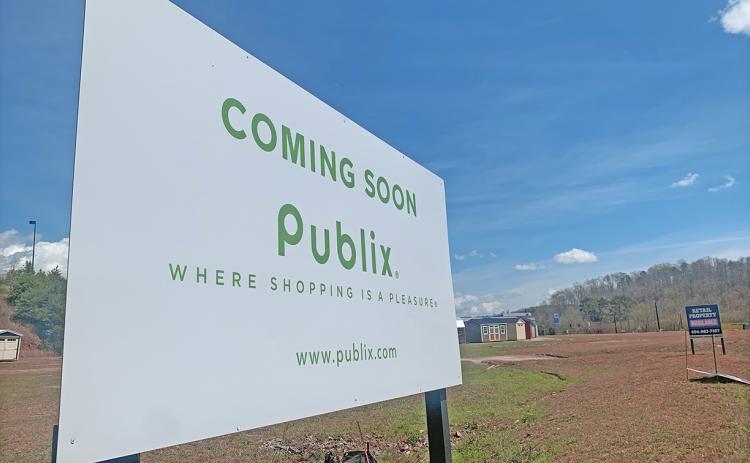 Last week a sign was spotted by local drivers at the intersection of Highway 60 and GA400 signaling the eventual location of a long-awaited grocery store in Lumpkin County.