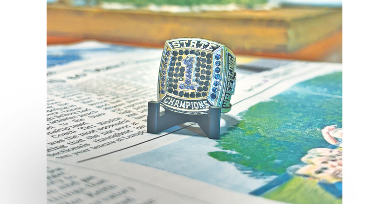 Nugget sports reporter Eligha Roper was presented with a State Championship ring by the Lady Indians wrestling team.