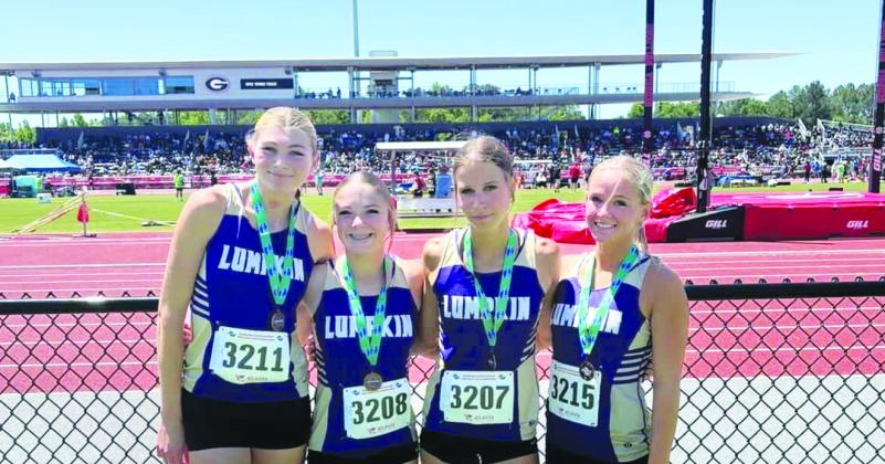 Lumpkin County runners Reagan Long, Maddox Henderson, Kellyn Coffer and Josie Webb broke their previously set school records in the 4x200 event at the State Championships.