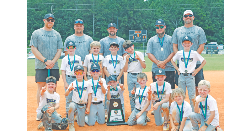 The Lumpkin County 8U baseball team celebrates with its State Championship trophy.