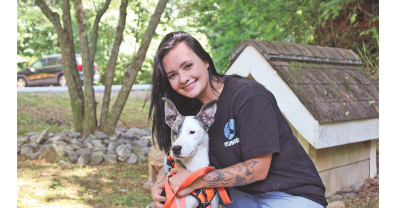 Friends of Lumpkin County Shelter Animals President Savana Borchers spends some quality time with one-year-old shelter dog Honda.