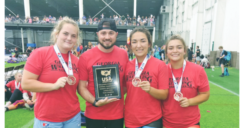 Pictured, from left, Faith Jones, Scott DeGraff, Mathiel Mendoza and Natalie Mendoza represented Lumpkin with distinction at the Womens National Duals in Indiana.
