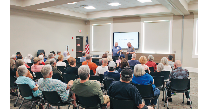 Sheriff Stacy Jarrard and District 9 State House candidate Roger Smith address the public during a special forum on Iron Mountain Park last Thursday.
