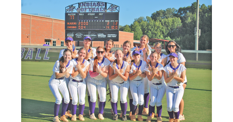 The Lady Indians celebrate their win over the Barrow Arts and Science Academy.