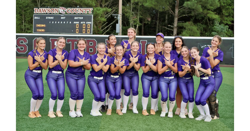 The Lady Indians celebrate their win over The Tigers on Dawson County’s field.