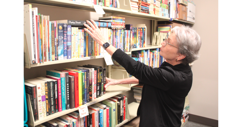 Lumpkin County Library volunteer Pat Gawthrop sorts new donations inside the Bargain Book Store’s processing room. Located just inside the library foyer, the store offers new and gently-used books, media, puzzles and games at affordable prices.