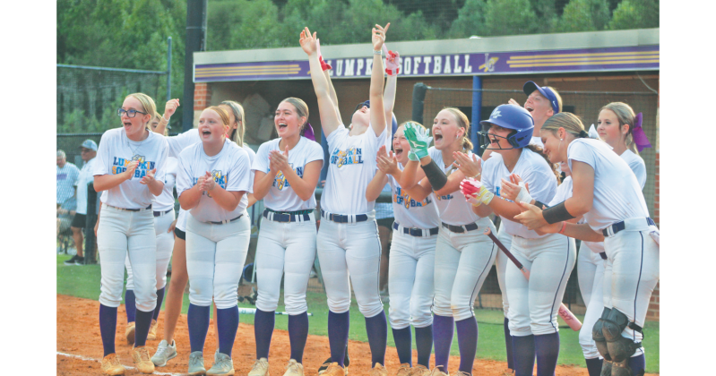 The Lady Indians celebrate a Riley Dyer home run during last week’s matchup against Morgan County.