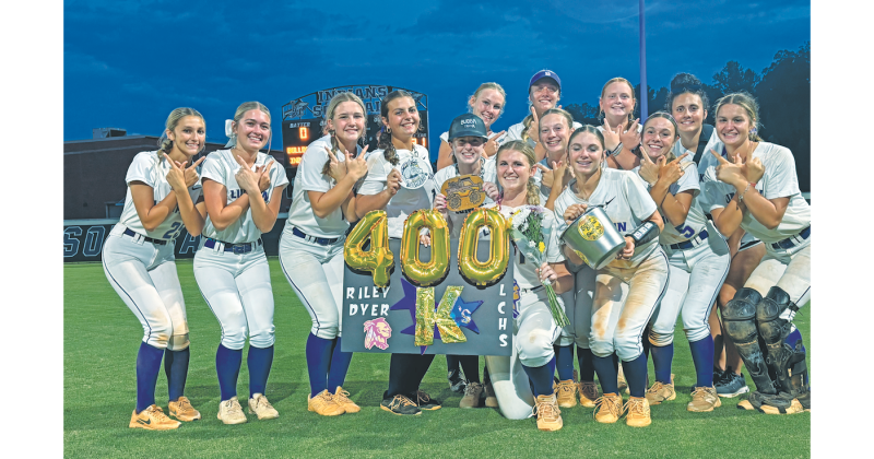 The Lumpkin County softball team celebrates their region win over Hart County.