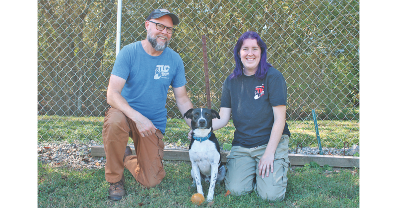 TLC Humane Society Director Sean Bailey, Goose and Animal Caregiver Elizabeth Gray (pictured from left) are ready to raise the “woof” at Saturday’s Bark in the Park festival.