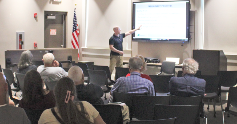 Georgia Mountains Regional Commission Planning & Information Services Director Adam Hazell reviews a list of priorities for the County’s next Comprehensive Plan during a meeting in the public library.