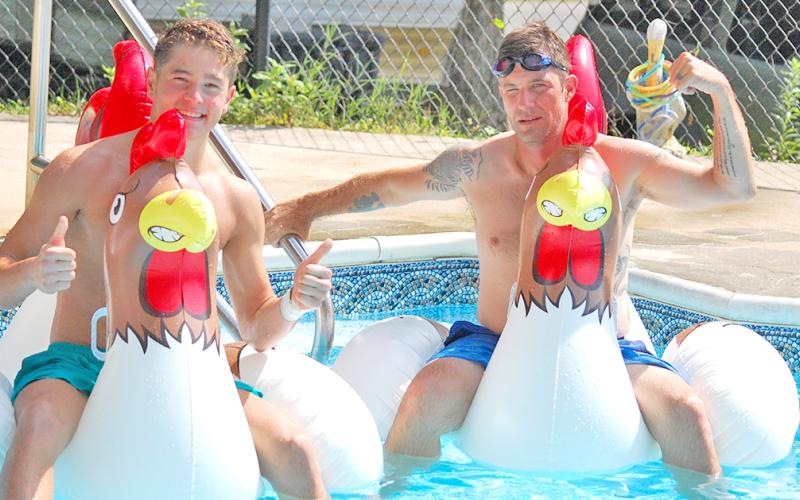 Mateo Golloshi (left) and sportswriter Greg Finan, Jr. take a breather between events in the latest edition of the Nugget Challenge.