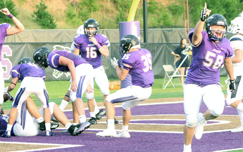 Indians defender Joseph Thomas celebrates after blocking a punt into the end zone. Aaron Hopkins fell on the ball for Lumpkin’s first touchdown in its season opener last Friday night.