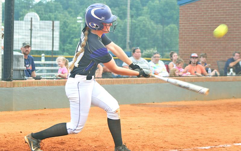 AK Wilson connects for a RBI double in Lumpkin’s season opener. Wilson went 3-for-4 at the plate with a RBI in the 14-8 loss.