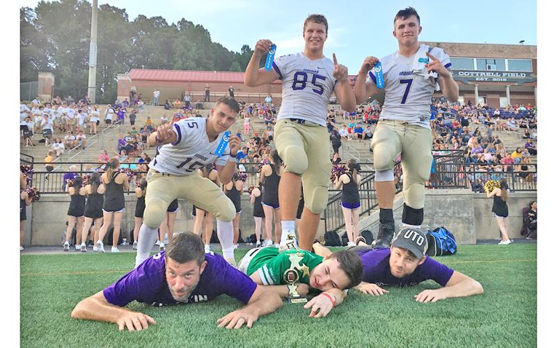 Celebrating their victory are LCHS players (from left) Trey Wilkes, Aaron Hopkins and Tucker Kirk. Team Nugget includes Greg Finan, Jr, Jake Cantrell and Matt Aiken.
