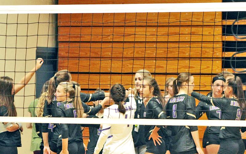 The LCHS varsity volleyball team gets pumped up before a match. The Lady Indians have won eight of their last 10 games, improving their overall record to 12-9.