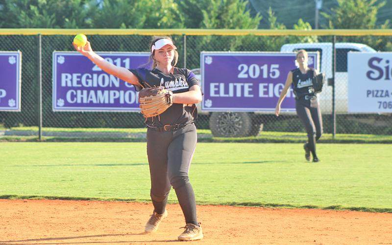 Lumpkin County second baseman Alyssa Pulley throws the ball to first base for an out after making a nice defensive play.