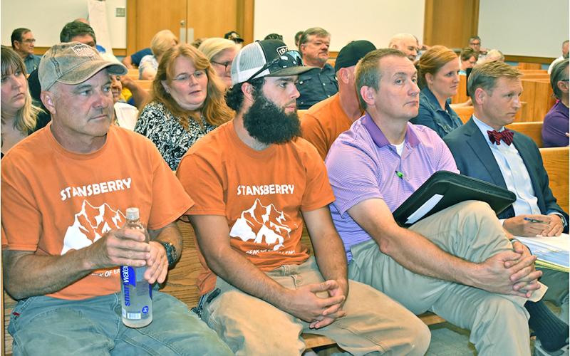 The Iron Mountain Park crew took up most of the two front rows at last week’s SLUA (Special Land Use Approval) hearing, but residents attending were far less than at previous meetings concerning the park. Front row, from left, are owner Craig Stansbury; his son, Hunter, Lewis Vaughn, manager for Stansbury’s several apartments; and attorney Kyle Williams.