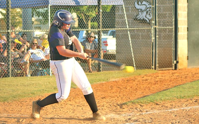 Lady Indians second baseman Alyssa Pulley connects for a hit against East Hall’s Macy Banks during the region champ-ionship series.
