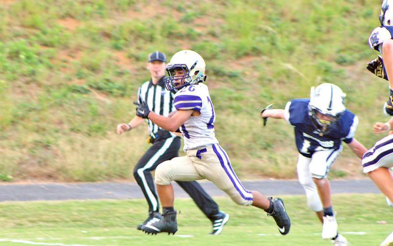 LCMS running back Jonathan Castillo breaks free to score one of his two touchdowns versus White County.