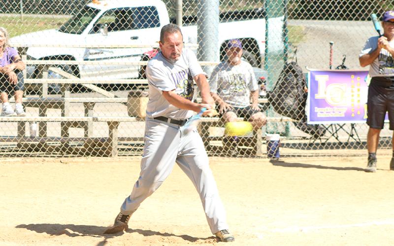 LC Miner outfielder Jerome “Jackhammer” Kitchens connects for a single to centerfield during Lumpkin’s Clayton League matchup with the Pickups last week.