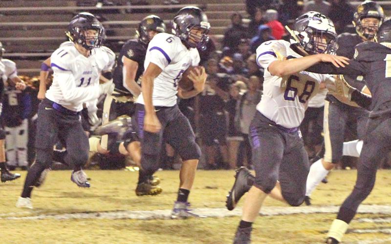 Tavion Lawrence (#6) weaves through the Vikings’ special team on his way to a 66-yard kickoff return. Lawrence’s sensational kickoff return set the Indians up for a nine-yard touchdown.