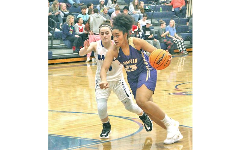 Freshman Kate Jackson drives to the basket for two of her 17 points in the Lady Indians’ win over the Banks County Lady Leopards on the road on Friday, Dec. 20.