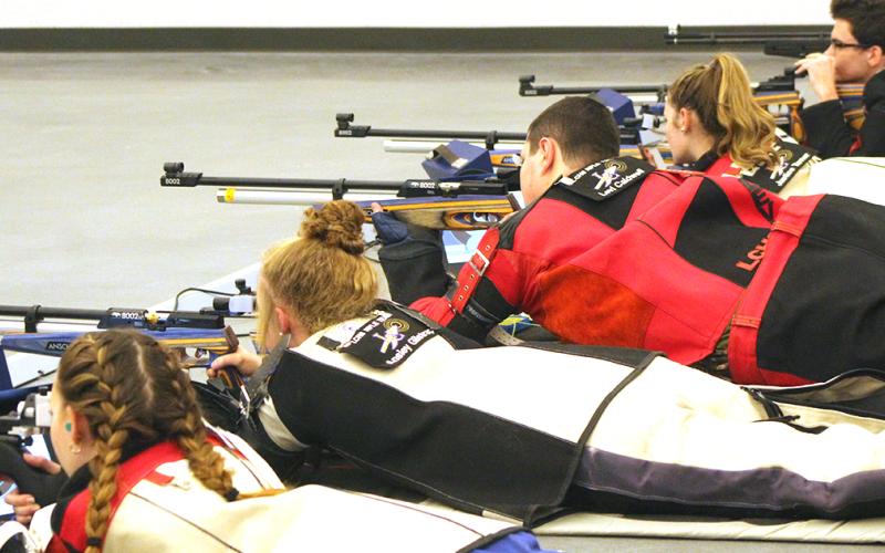 The LCHS rifle team takes aim during a match at the Hunting Grounds rifle range. The Indians defeated Roswell High School last week to improve to 2-1 on the season.