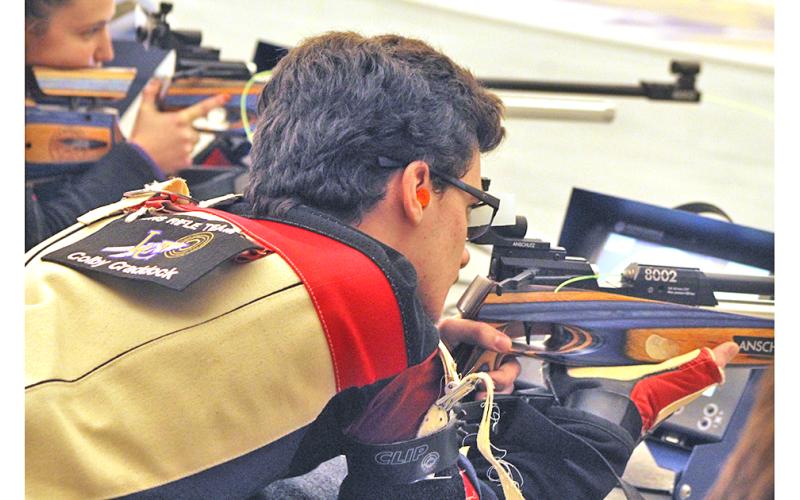 LCHS rifle team captain Colby Craddock takes aim during competition. Craddock earned Top Gun honors for the Indians to help Lumpkin eke out a win versus Duluth High School at the Indian Hunting Grounds last Thursday, Dec. 19.