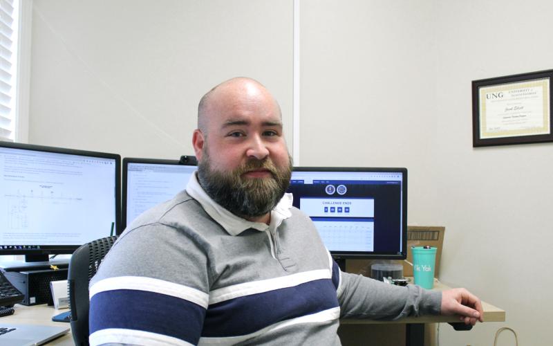 The Cyber Hawks worked their way to top honors in the NSA Codebreaker challenge. (Pictured) North Georgia alum Jacob Elliott helped coach the team on the way to victory.