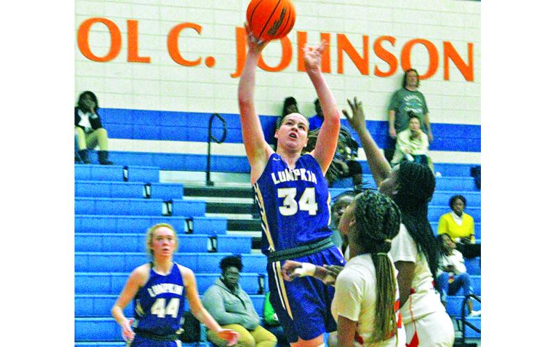 Junior Makenzie Caldwell goes up strong against the Atom Smashers’ defense for a bucket and one during the Lady Indians’ loss to Johnson Savannah this past weekend.