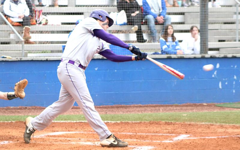 Caleb Childs rips a two-run double down the left field line to give Lumpkin an early 2-0 lead over the Fannin County Rebels. The Indians eventually won the region matchup 5-4 after the game was called due to heavy rain and lightning.
