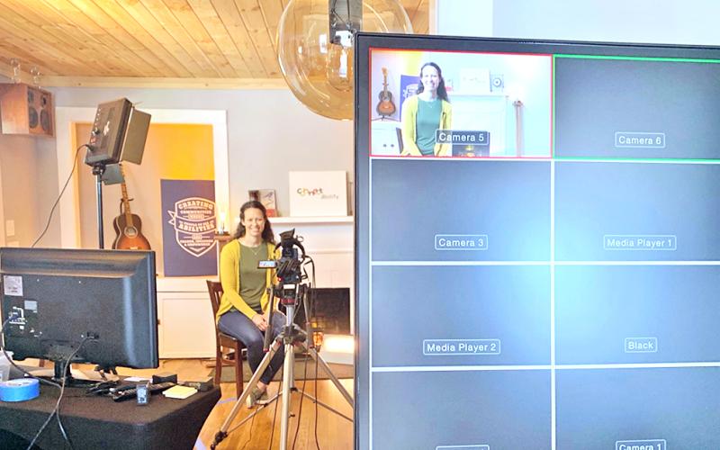 Connectability Executive Director Jacqueline Daniel reads a children's book on camera at App Studios as part of the Smalltown Celebrity Story Time. (Photo by Matt Aiken)