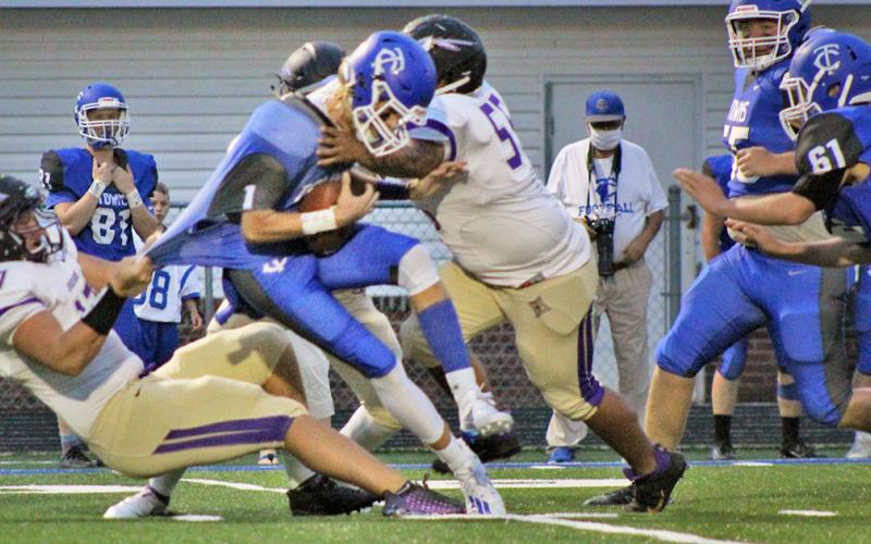 Led by Drew Allison (left) and JoJo Allison, the Lumpkin defense blow up the first play of the game from scrimmage, sacking the quarterback and wreaking havoc.